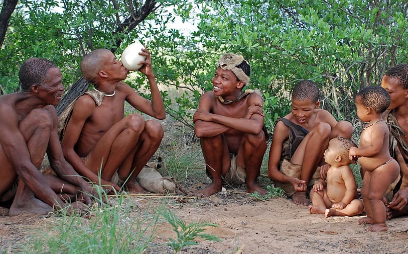 Tribe resting together in different postures